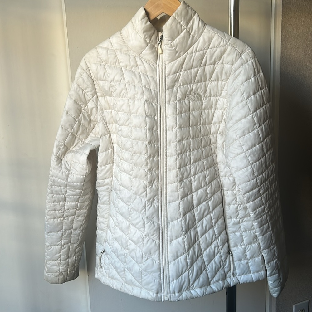 The North Face zip up puffer jacket size L